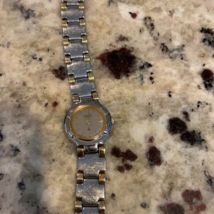 Silver and gold Seiko watch